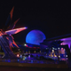 Starblaster ship in front of Guardians of the Galaxy: Cosmic Rewind, with EPCOT's Spaceship Earth in the background.